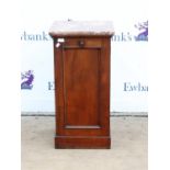 Victorian mahogany bedside cabinet, the marble top over a panelled door on a plinth base,
