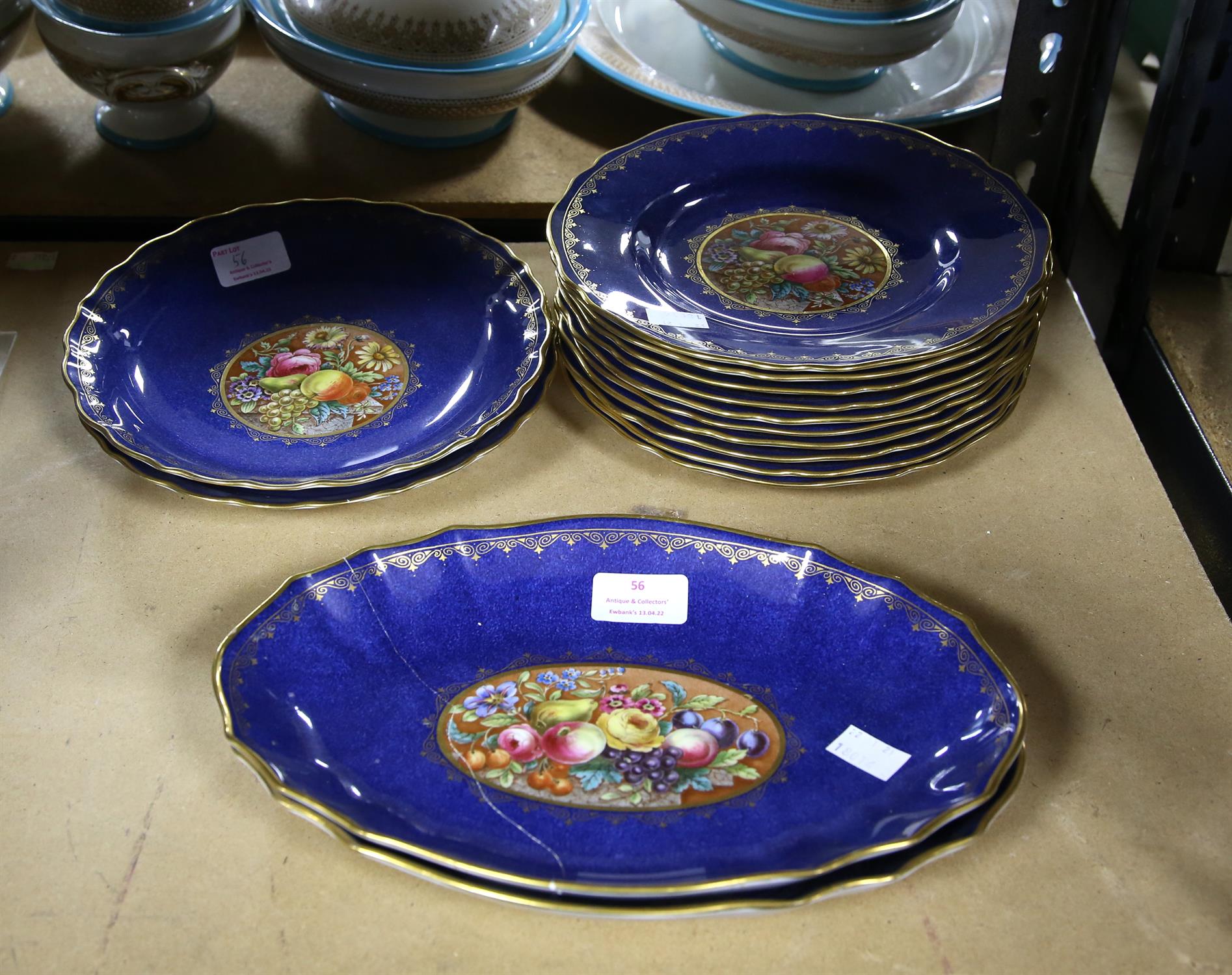 Ten Copeland Spode side plates, two oval dishes, and two round dishes, all with floral and fruit