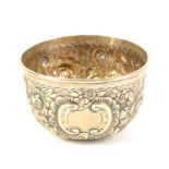 Silver repousse bowl with floral and scroll decoration, London 1899, 12 cm diameter, 6 oz
