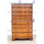 Mahogany and burr walnut bowfront chest on chest, with four long over four long graduated drawers