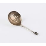 Novel silver pierced caddy spoon with a finial of an imp Birmingham 1926