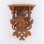 Late 19th/early 20th century Black Forest carved oak wall bracket with a deer and oak leaves,