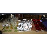 Set of twelve German wine glasses, with yellow or green stems, eight rose decorated coffee cans and