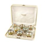 A set of eight Tiffany favrile glass open salts in original case, each etched L.C.T. on the base,