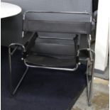 Wassily chair after the design by Marcel Breuer in black leather and polished chrome