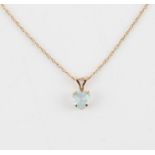 10ct gold heart shaped topaz pendant on a 9ct gold chain