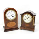Early 20th century inlaid and crossbanded mahogany table clock, the arched case with inlaid