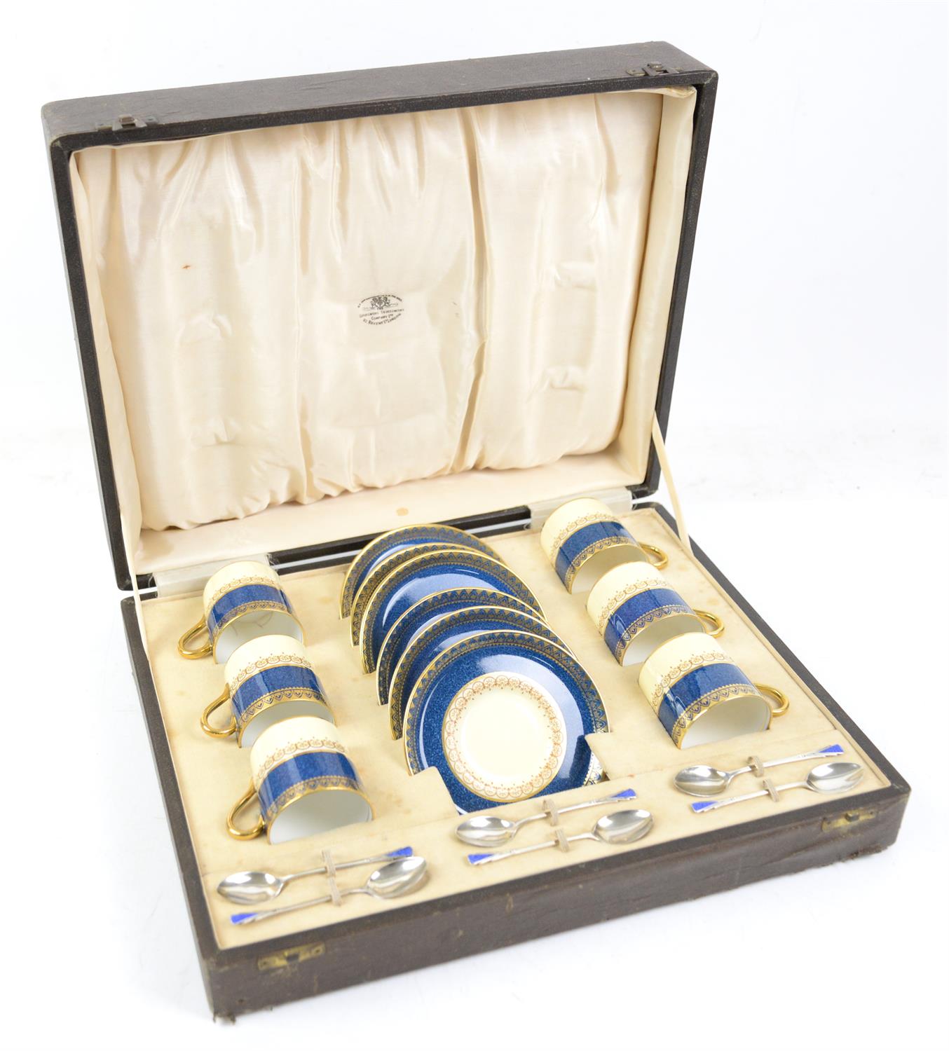 Cased set of Aynsley coffee cans and saucers with silver spoons, powder blue design