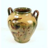 Glazed pottery jar painted with swans, signed indistinctly on the base, H33cm, on a wrought and