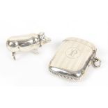 Silver vesta case in the form of a pig, stamped 925, 4.5 cm long, and another silver vesta case (2)