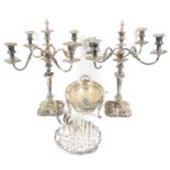 Pair of silver plated five light candelabra with scrolling arms on tapering columns H 53cm,
