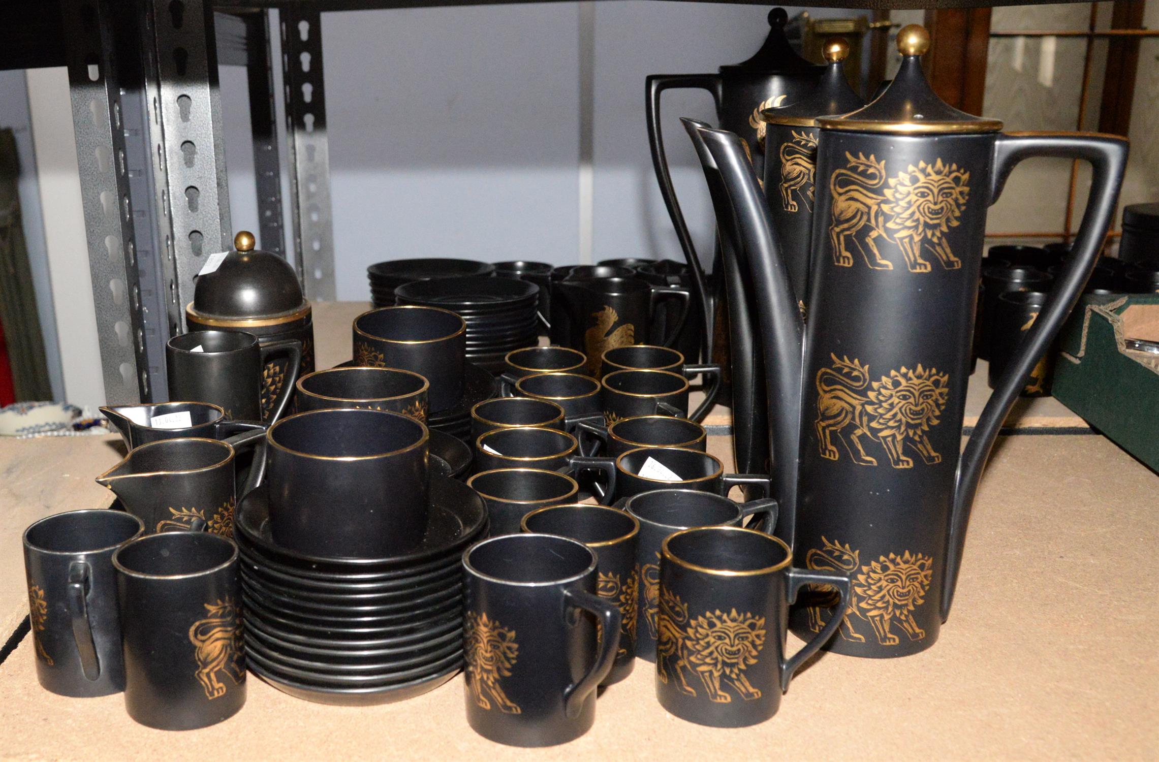 Portmeirion Pottery Lion design coffee wares, including two coffee pots, 15 coffee cans, 32 saucers,