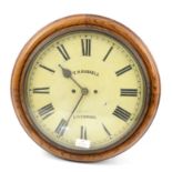 Victorian oak circular wall clock, the painted dial inscribed T.R. Russell, Liverpool,