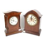 Early 20th century German inlaid mahogany mantel clock, the shaped top over columns enclosing a