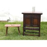 Ray & Miles 20th century oak cupboard/table top with foliate carved decoration together with elm