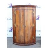 19th century mahogany and shell inlaid bow-fronted wall hanging corner cupboard, 108 x 70 cm