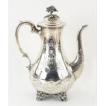 Early Victorian silver coffee pot the pear shaped body with engraved decoration, and cast foliate