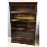 Mahogany Globe-Wernicke four section bookcase, with graduated tiers and moulded base drawer,
