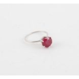 Ruby ring, round cut ruby weighing an estimated 3.66 carats, six claw set in 9 ct white gold,