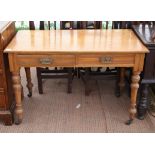 Early 20th century oak dressing table, with two frieze drawers on turned legs with pot castors,