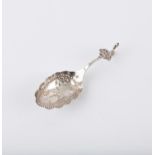 Large Victorian silver caddy or wine spoon with archer finial, import by Solomon Nathan Nyburg,