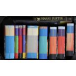 Collection of Harry Potter books, including first editions of the following: Harry Potter and the