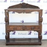 Victorian carved oak buffet, the raised mask carved back over two tiers with two drawers and