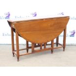 Mahogany drop leaf table, the oval top on square legs, stretchers and pad feet, H73 W121 Open 120