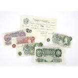 White five-pound banknote and five other British banknotes