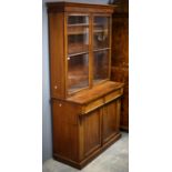 Victorian mahogany bookcase cabinet, with glazed twin doors over two frieze drawers and two