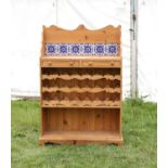 20th century pine wine rack with tiled back and under tier