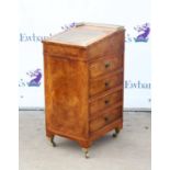 20th century walnut Davenport with sliding top and four drawers on castors,