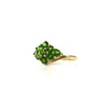 Green diopside ring, nine round cut green diopside stones set in a diamond shape,