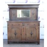 20th century oak dresser with mirrored back and spiral turned columns over two drawers,