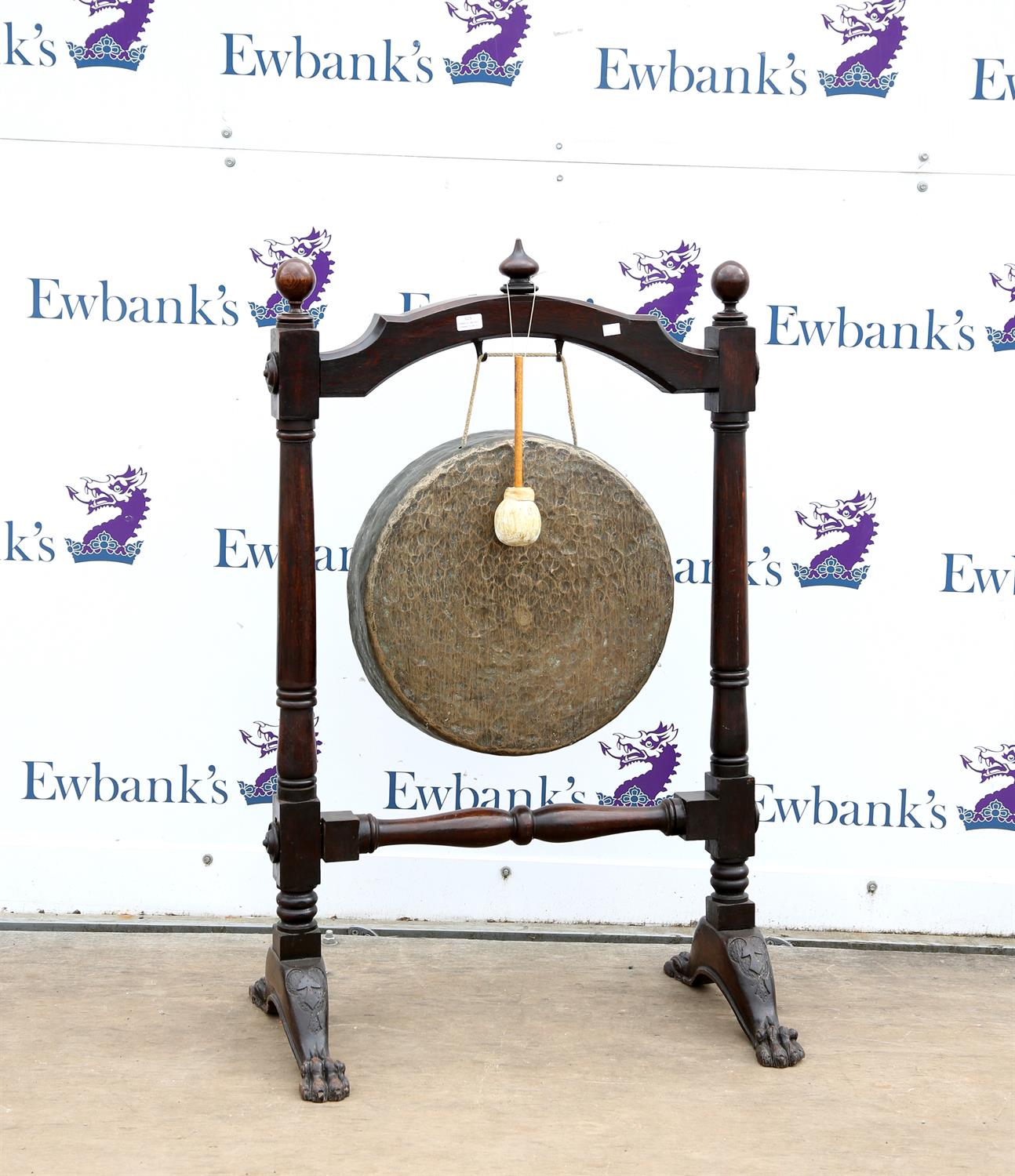 Large early 20th century bronze dinner gong 48cm dia. the stained mahogany stand H120cm W78cm