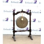 Large early 20th century bronze dinner gong 48cm dia. the stained mahogany stand H120cm W78cm