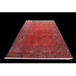 Royal Kashan carpet, stylised floral design on a red field within a multiple border, 310 x 200 cm