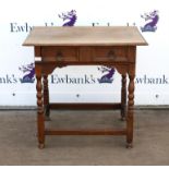 18th century oak side table, the rectangular top over a twin panelled frieze drawer on turned and
