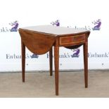 George III mahogany Pembroke table, the oval top over a bowed crossbanded drawer on husk inlaid
