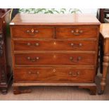 George III mahogany chest of drawers with deal sides, the two short and three long graduated