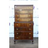 Reproduction mahogany chest on chest, of four over four drawers on squat cabriole legs,