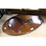 Inlaid mahogany oval tray with brass handles. 66 x 41 cm, and a smaller oval mahogany tray (2)