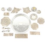 Various Indian white metal boxes and panels, and a silver plated circular tray