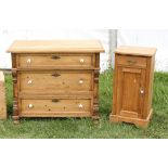 Pine three drawer chest and a pine bedside cupboard (2)