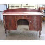 19th century mahogany sideboard, the raised back over a central drawer flanked by cupboard doors on