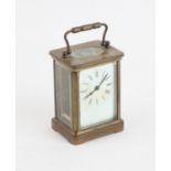 Late 19th century carriage clock with barrel movement, white enamelled dial with Roman numerals,