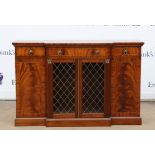 Regency style mahogany and brass strung breakfront side cabinet, the three frieze drawers over a