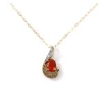Fire opal and diamond pendant, oval cut fire opal with three small diamonds set above,