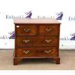 George II style featherbanded chest of drawers, with two short and two long on bracket feet,