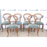 Set of six Victorian walnut spoon back side chairs with cabriole front legs